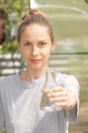 woman researcher testing the water qualityの写真素材