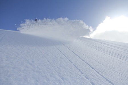 spray snow, freeride in the winter mountainsの写真素材