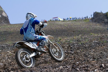 SOCHI, RUSSIA â AUGUST 16, 2014: Off-road motorcycle rider trains in summer mountainsのeditorial素材