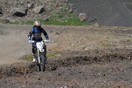 SOCHI, RUSSIA â AUGUST 16, 2014: Off-road motorcycle rider trains in summer mountainsのeditorial素材