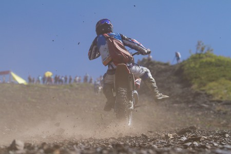 SOCHI, RUSSIA â AUGUST 16, 2014: Off-road motorcycle rider trains in summer mountainsのeditorial素材