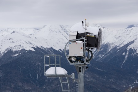 SOCHI, RUSSIA - FEBRUARY 26, 2014: Snow cannon in the mountains, ski resortのeditorial素材