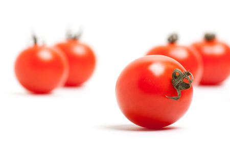 Organic Red Cherry Tomatoes on White Backgroundの写真素材