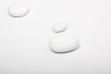 natural white pebbles on white backgroundの写真素材