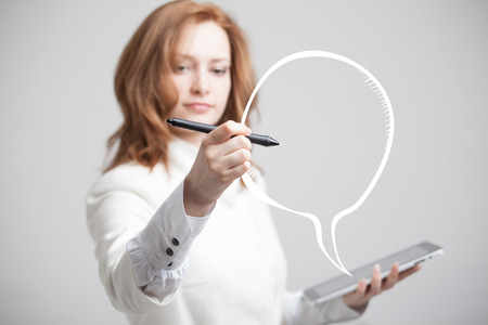 woman writes in a painted bubble