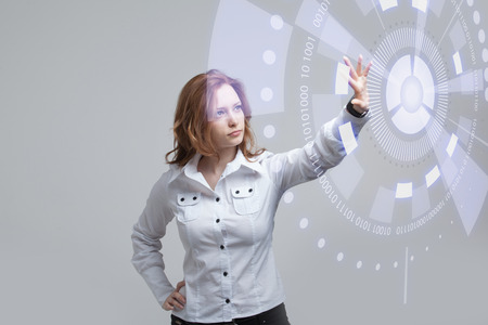Future technology. Touch button interface. Woman working with futuristic interface