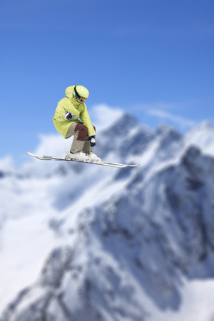 Flying skier on mountains, extreme sportの写真素材