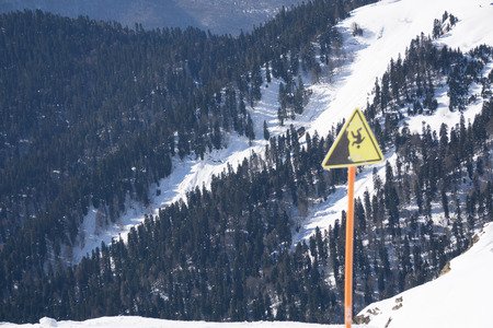 danger steep cliff mountain sign, ski resortの写真素材