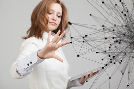 Global network connection concept, young woman working with futuristic interface.の写真素材