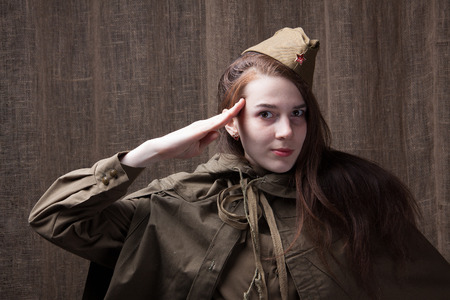Young woman in Russian military uniform. Female soldier during the second world war.の写真素材