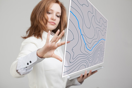 Geographic information systems concept, woman scientist working with futuristic interface in GIS...