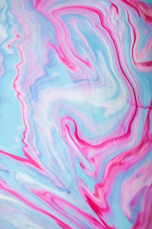 Abstract colored background. Stains of paint on the water. Ebru art, marbled paper.の写真素材