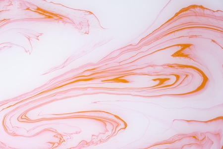 Abstract colored marble background. Stains of paint on the water.の写真素材