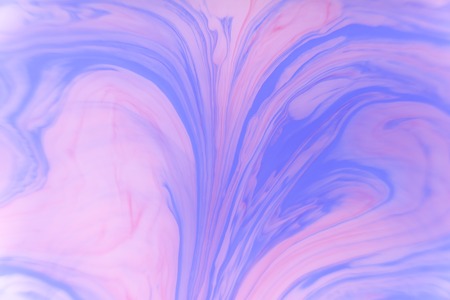 Abstract violet marble background. Stains of paint on the water.の写真素材