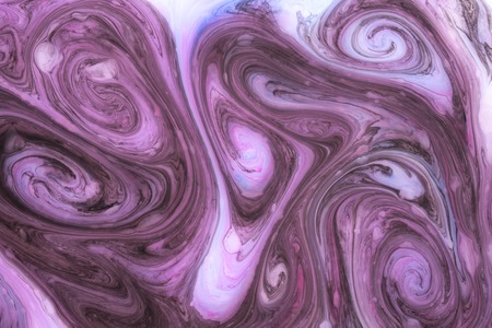 Abstract paint ink, psychedelic background. Colorful spots on water surface.の写真素材