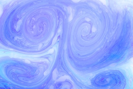 Abstract paint ink, psychedelic background. Colorful spots on water surface.の写真素材