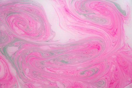 Abstract paint ink, psychedelic background. Colorful spots on water surface.