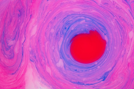Abstract paint ink, psychedelic background. Colorful spots on water surface.
