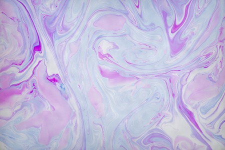 Abstract violet marble background. Stains of paint on the water.の写真素材