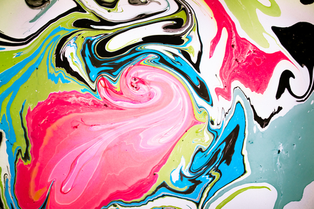 Abstract colored background. Stains of paint on the water. Ebru art, marbled paper.