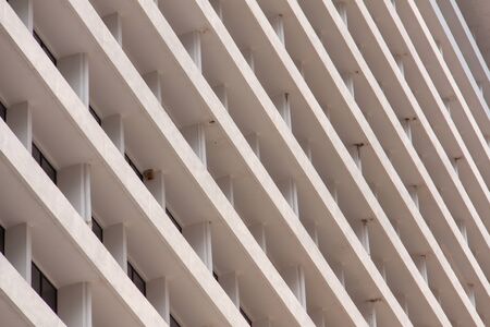 Glass windows in the daytime. Arcitectural fragment of modern building.
