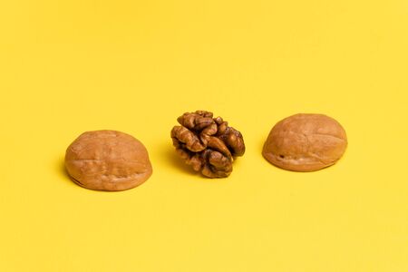 Delicious walnut on yellow background.の写真素材