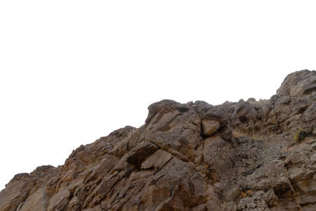 Rock mountain slope or top foreground close-up isolated on white background. Element for matte painting, copy space.の写真素材
