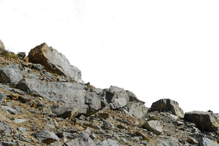 Rock mountain slope or top foreground close-up isolated on white background. Element for matte painting, copy space.の写真素材