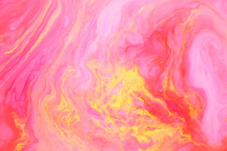Abstract colored marble background, stains of pink and yellow paint on the surface of the water. Liquid colorful backdrop.の写真素材