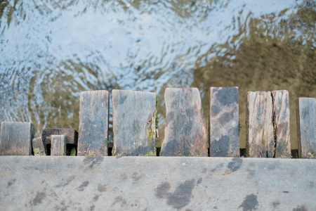 Old wooden bridge over the canalの写真素材