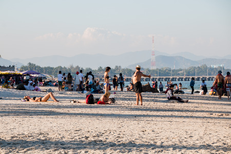 Prachuap Khiri Khan, Thailand - Dec 25: Tourists enjoy the sunny weather and relaxing at Huahin beach on Dec 25, 2016 in Prachuap Khiri Khan, Thailandのeditorial素材