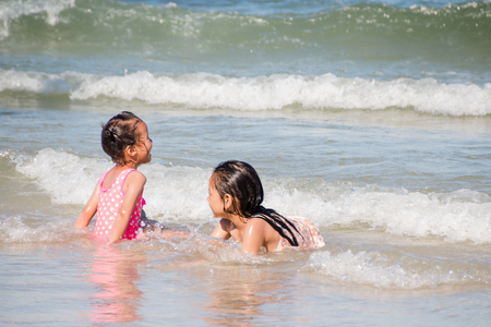 Prachuap Khiri Khan, Thailand - Dec 25: people enjoy on the beach at Hua Hin on Dec 25, 2016 in Prachuap Khiri Khan, Thailandのeditorial素材