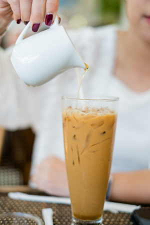 Pour the syrup into a Coffee Latteの写真素材