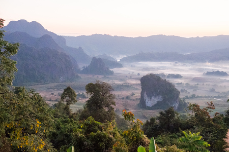 Scenic mountain landscape and fog on the hill in Phu Lung ka in Phayao province, Thailandの写真素材