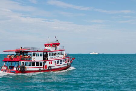 Surat Thani, Thailand - June 24, 2017: A wooden ferry carries tourists to Koh Samed Island, Thailand.のeditorial素材
