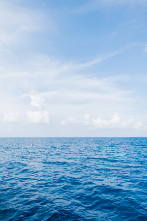 Calm Sea and Blue Sky Background in Maldivesの写真素材