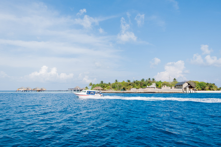 Calm Sea and Blue Sky Background in Maldivesの写真素材