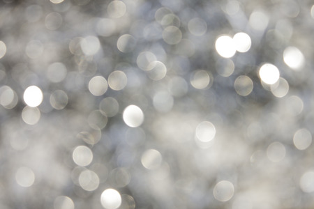 defocused silver bokeh backgroundの写真素材