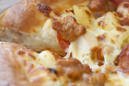 closeup of crust pizzaの写真素材