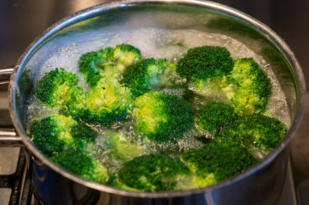 boiling broccoli in waterの写真素材
