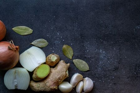 top view of ingredients on a dark floor, with copy space can be used as a background, preparation of foodの写真素材