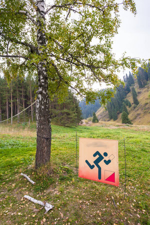 A pointer to the distance orienteering in the forest in the mountainsの写真素材