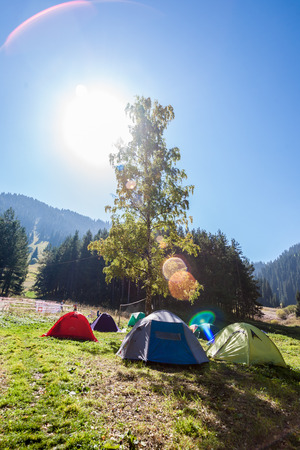 A tent camp in the mountains near the forestのeditorial素材
