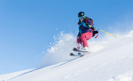 Active winter holidays, skiing and snowboardingの写真素材