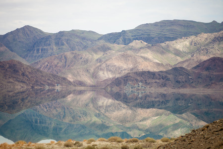Lake with reflection of mountainsの写真素材