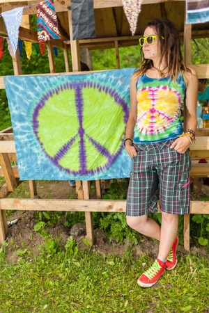 People in bright clothes with pacifist flagのeditorial素材