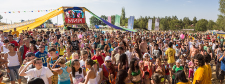 A large number of people in the colorful outdoor festivalのeditorial素材