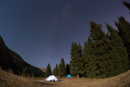night camping under the stars Mountainsの写真素材