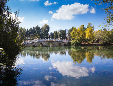 Chinese gazebo in the city pondの写真素材