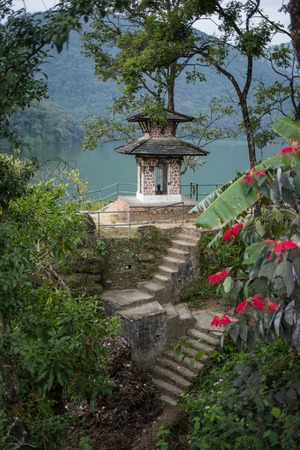 Temple on top of mountain on misty morningの写真素材